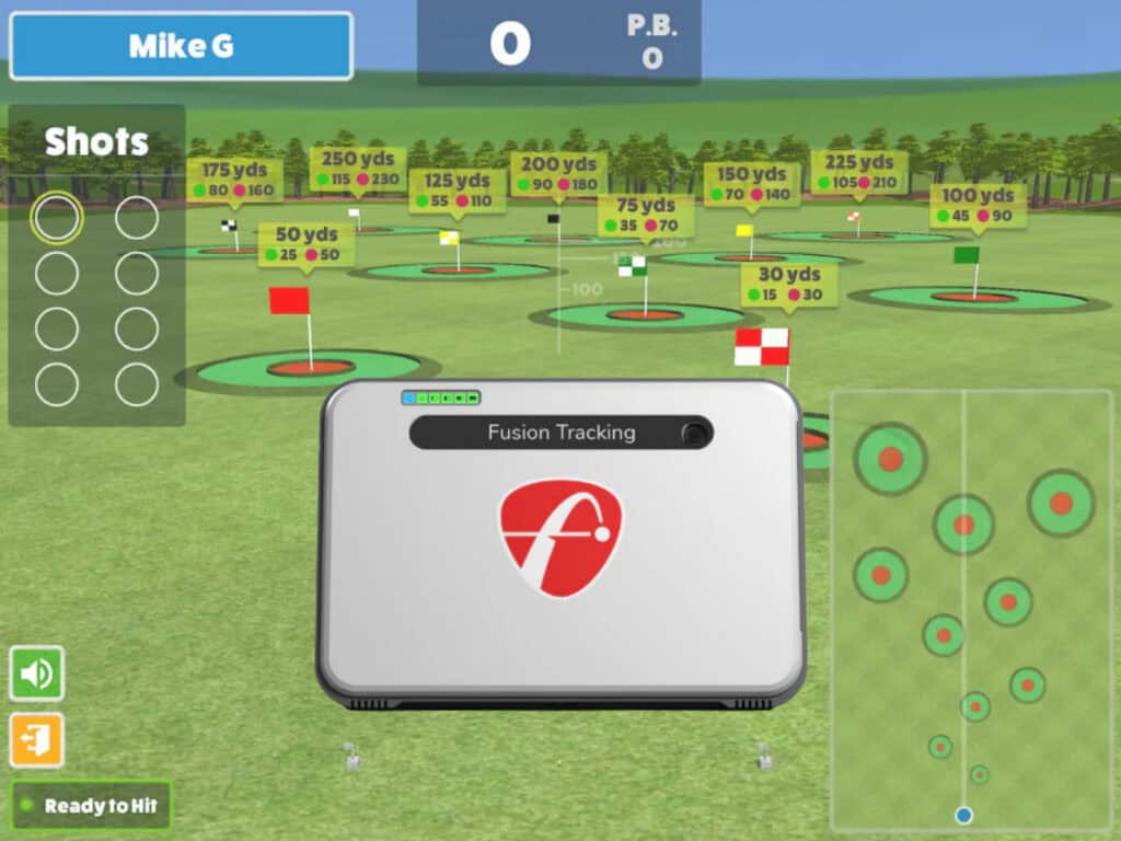 High-tech golf simulator with fusion tracking technology, displaying shot distances, target zones, and detailed analytics for improving golf game performance.